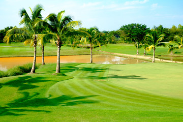 beautiful green fairway glof course clear sky background