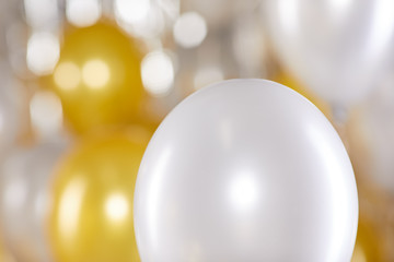 Golden and silver balloons background. New Year concept 