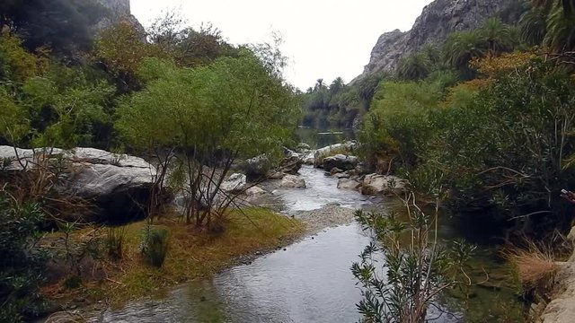 The river Megalopotamos pass through Kourtaliotis canyon. Preveli Lagoon, Crete, Greece.