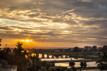 Four bridges of Badajoz City at sunset with cloudy sky