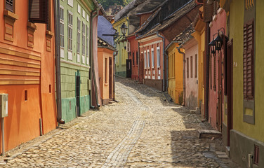 Fototapeta na wymiar View of colorful houses on Sighisoara street
