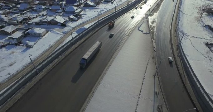 Highway and cars in winter Aerial video