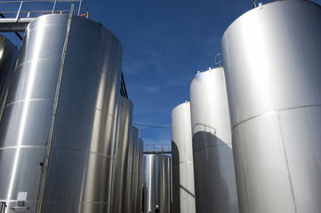 Modern aluminum barrels where grape juice is aged into wine
