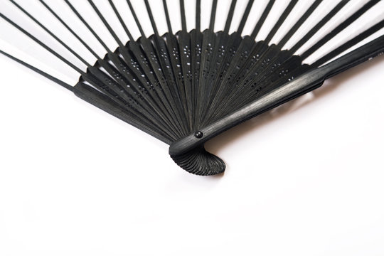 Japanese stylish black/white fan is isolated on a white background