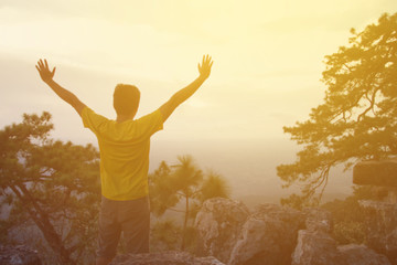 Blurry of men show arm up for achievements successful and celebr