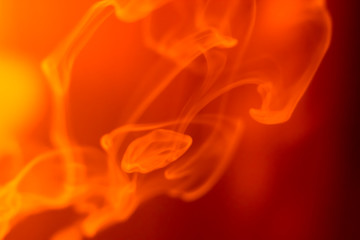 Vape smoke over red background