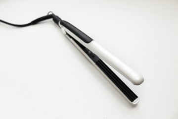 hair curling iron isolated on white background