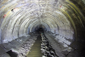 Underground river Neglinnaya flowing in the collector sewer under Moscow.  