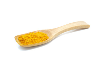 Turmeric powder with wooden spoon on white background.