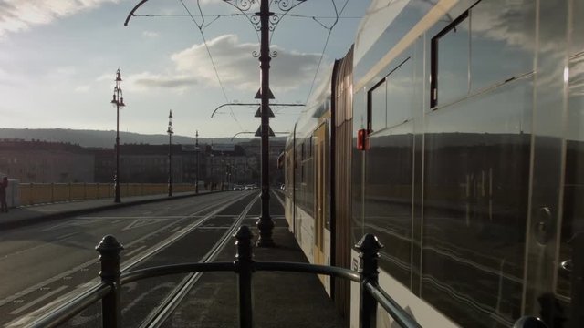 tram traffic on Margit bridge, Budapest, Hungary.Bakground is old town