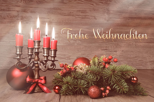 Vintage Christmas still life with candles and decorations, text