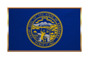 Flag of Nebraska , golden frame, fabric texture
