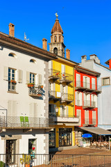 Church tower and facades of buildings Ascona Ticino Switzerland