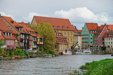 Fototapeta na wymiar Fishermen houses over Regnitz River in Little Venice Bamberg
