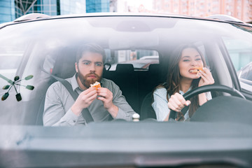 Couple with eat in car