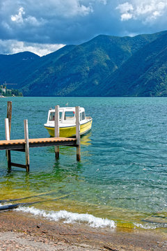 Motor Boat at landing stage in Lugano in Ticino Switzerland