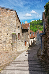 Fototapeta na wymiar Narrow Street in Besancon in Bourgogne Franche Comte in France