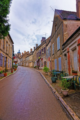 Fototapeta na wymiar Narrow Street in Vezelay in Bourgogne Franche Comte in France