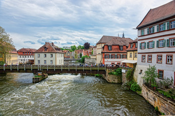 Fototapeta na wymiar Old houses and Regnitz River in city center Bamberg