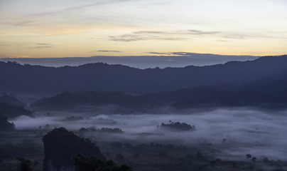 Fototapeta na wymiar Sunrise and fog in the morning, Thailand.