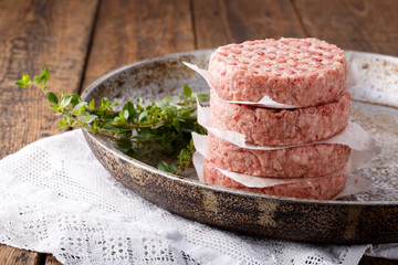 Raw minced meat burgers