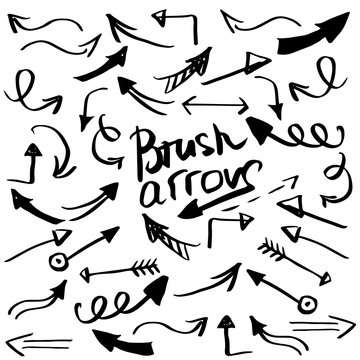 Hand draw brush arrow. Sketch design concept arrow.Set arrow isolated on the white background. 