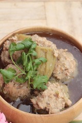 Soup with bitter melon stuffed with minced pork.