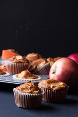 apple muffins on a black background