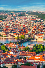 Panorama of the old part of Prague from the Petrin tower. Beautiful view on the bridges over the...