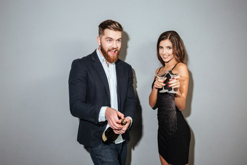 Happy friends with champagne