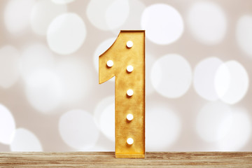 Big plastic numbers with shining light bulbs