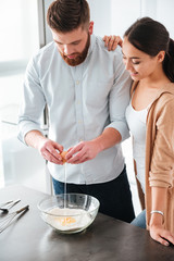 Happy couple in kitchen
