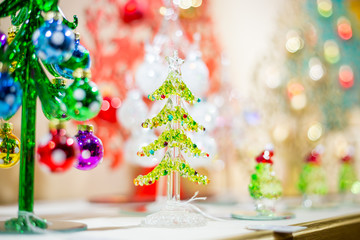 Little Christmas Glass Tree standing in the Christmas Shop