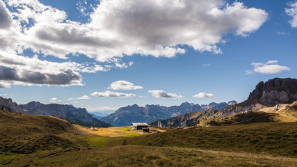 Fototapeta premium Great view of the Val di Fassa valley. National Park Dolomites (Dolomiti), pass Sella. Location famous resort Canazei, Tyrol, Alp, Italy, Europe. Dramatic and picturesque scene. Beauty world.