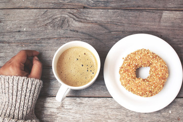 Selfie of donut with coffee cup