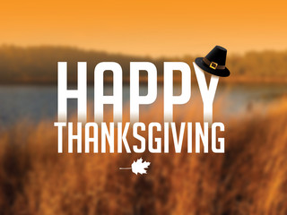 Happy Thanksgiving message with Pilgrim hat and maple leaf against an autumn lake scene. - 128064923