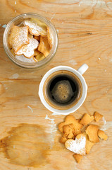 Homemade shortbread with powdered sugar cookies and coffee