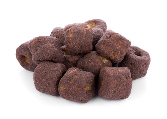 Crunchy corn chocolate snacks on a white background