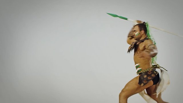 American Indian . Man throwing spear. Hunting .