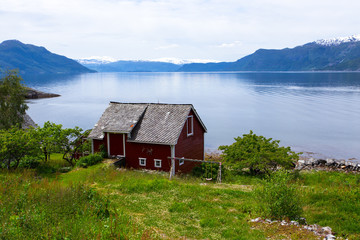 Fototapeta na wymiar rural house on a fjord coast