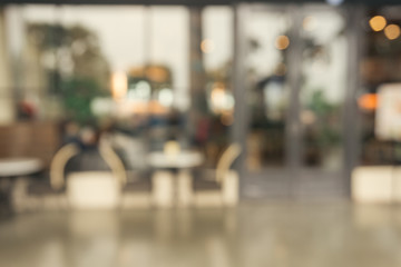Blurred background - Coffee shop blur background with bokeh. Vintage filtered image.