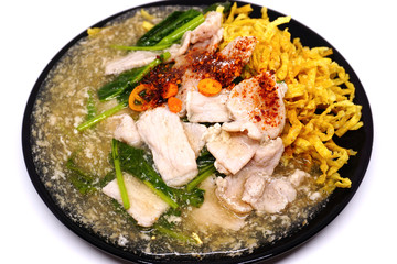 Crispy fried noodle pork with raadna sauce and top with thai chilli, One popular dish in Thailand.