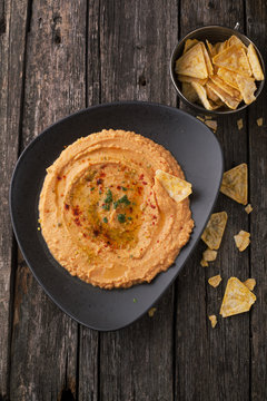 Hummus, spices, rosemary and bread crisps