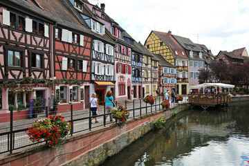 Fototapeta na wymiar Colorful traditional french houses on the side of river Colmar, France, Alsace
