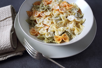 Farfalle pasta with grated cheese