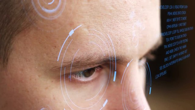 Computer programmer coding on futuristic holographic display