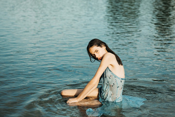 Pretty girl in water