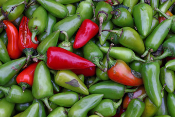 Green hot jalapeno chili peppers close up