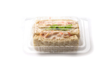 Sandwich in plastic package white background 
