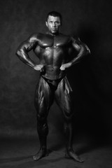 Fototapeta na wymiar Muscular male Bodybuilder posing